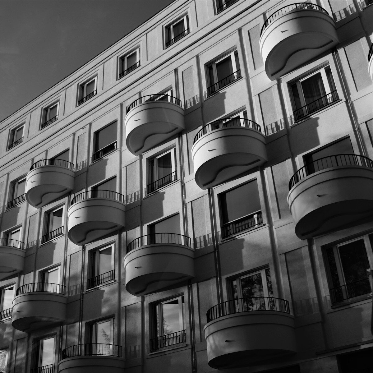 grayscale photo of concrete building